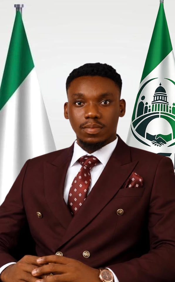 Akinmboni Marcus O. in front of the Nigerian flag and the Strategy Governance Initiative flag
